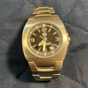 Men’s Authentic Dodge Wear silver watch.